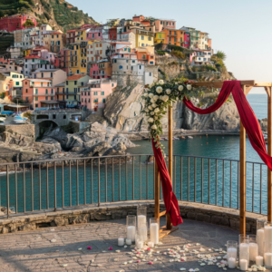Elopement ceremony setup with red ribbon on a terrace above the Cinque Terre sea at Porto Roca – porto roca elopement – Kiss Me Italy