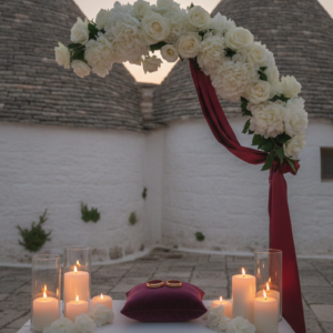 Anniversary vow renewal with rings and candles among the trulli of Puglia – trulli vow renewal – Kiss Me Italy